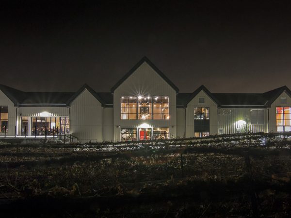 Night view of the front of Adamo Estate Winery