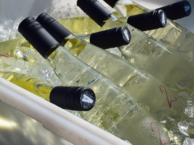 wine bottles in an ice bucket